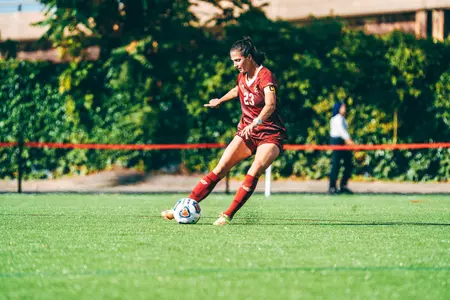 Michela Agresti kicks the ball against BU.