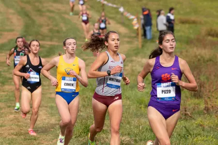 Ella Whitman running at the ACC Championship