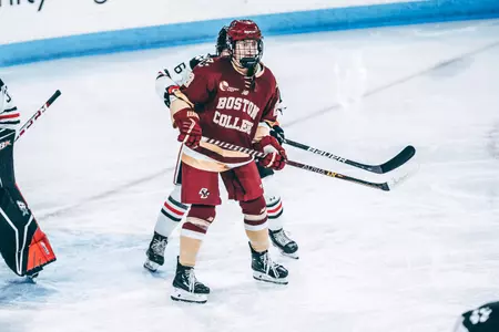 Gaby Roy fights for position in front of the net.