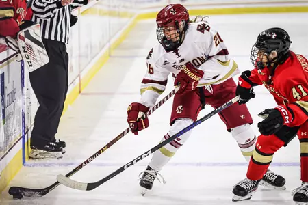 Sidney Fess looks to move the puck against Northeastern.