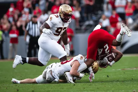 Cole Batson drags down the ball carrier at NC State.