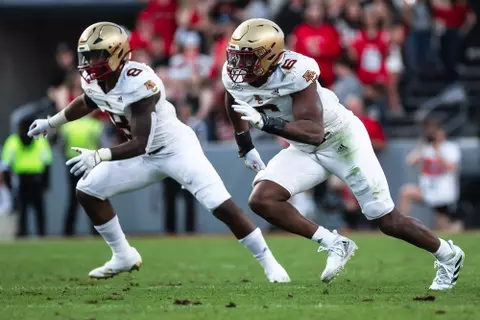 Donovan Ezeiruaku comes off the line at NC State.