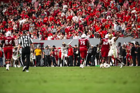 Elijah Jones with a fist in the air after his interception at NC State.