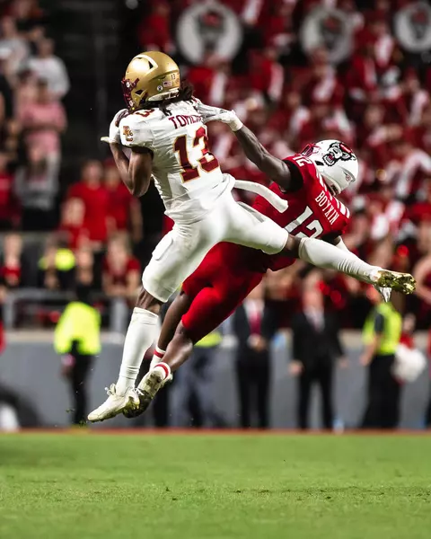 Dino Tomlin makes a contested catch at NC State.