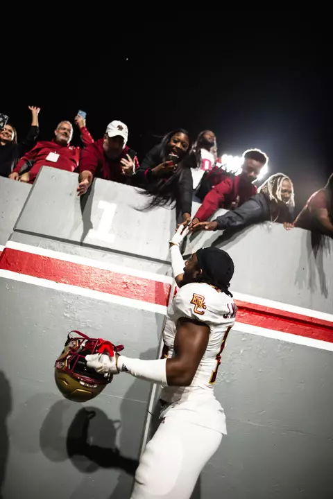 Jalon Williams high-fives BC fans at NC State.