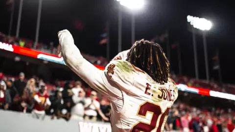 Elijah Jones raises his arms to the BC crowd at NC State.