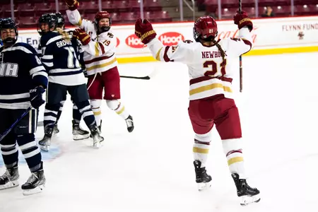 Abby Newhook and Hannah Bilka celebrate a goal against New Hampshire.