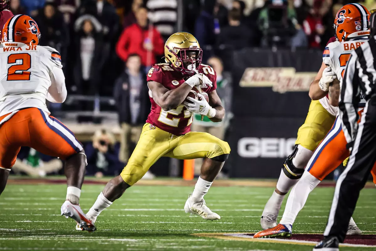 Pat Garwo rushes with the ball against Syracuse.