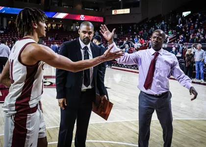 BC Men's Basketball - Earl Grant congratulates Makai Ashton-Langford
