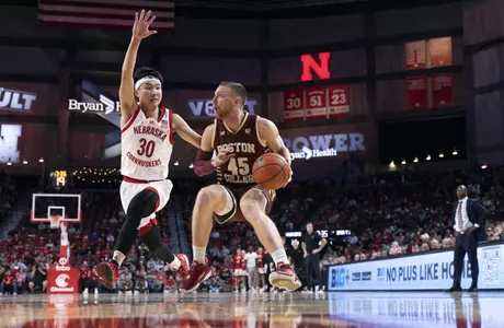 Boston College's Mason Madsen (45) drives against Nebraska's Keisei Tominaga (30) during the second half of an NCAA college basketball game Wednesday, Nov. 30, 2022, in Lincoln, Neb. (AP Photo/Rebecca S. Gratz)