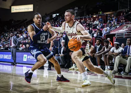 BC's Mason Madsen drives to the basket in the win over Rhode Island