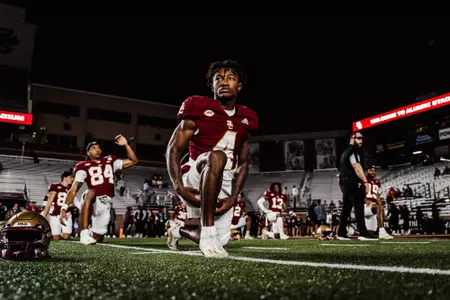 Zay Flowers stretches prior to kickoff vs. Duke.