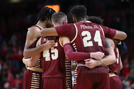 Boston College Mens Basketball team huddle