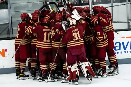 The Eagles celebrate after a win at Providence