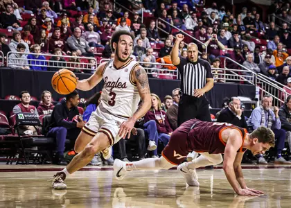 Jaeden Zackery gets by VT's Sean Pedulla