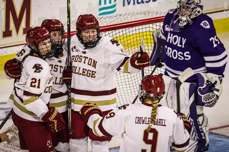 The Eagles celebrate a goal against Holy Cross.