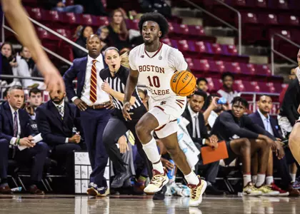 Prince Aligbe brings the ball up the court for Boston College