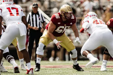 Drew Kendall blocks against Rutgers