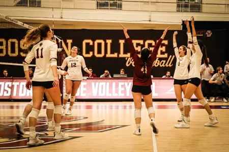 BC Volleyball celebrates after win vs Xavier