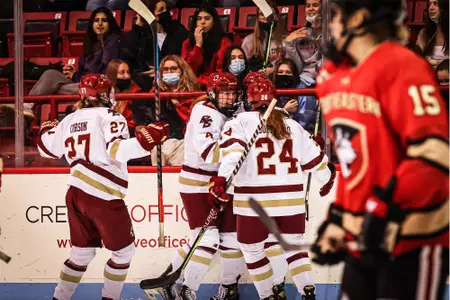 The Eagles celebrate Alexie Guay's goal.
