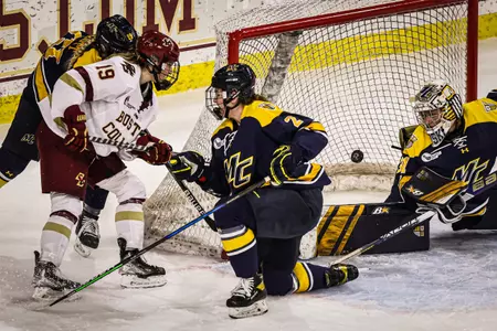 Hannah Bilka backhands in a goal against Merrimack.