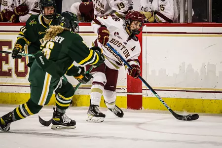 Olivia Finocchiaro looks to dump the puck in against Vermont.