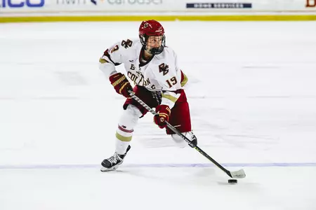 Hannah Bilka carries the puck up the ice against Providence.