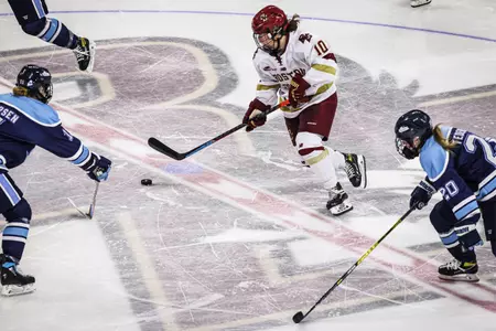Caroline DiFiore carries the puck up the ice against Maine