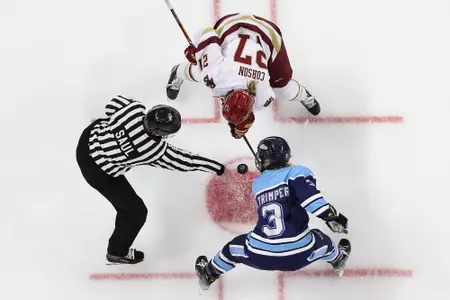 Willow Corson takes a faceoff agains Maine.