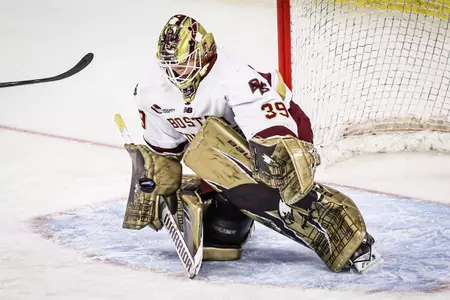 Abbey Levy makes a save in a game.