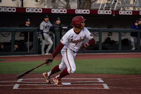 Cameron Leary swings vs Holy Cross