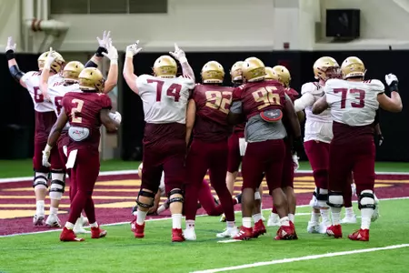 Offensive linemen signal touchdown