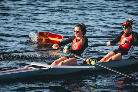 The Eagles compete in a four-person boat in the Charles River.