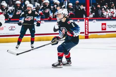 Kali Flanagan skates in the offensive zone in a game for Team USA.