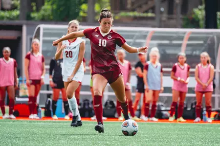 Emily Sapienza makes a pass with her left foot.