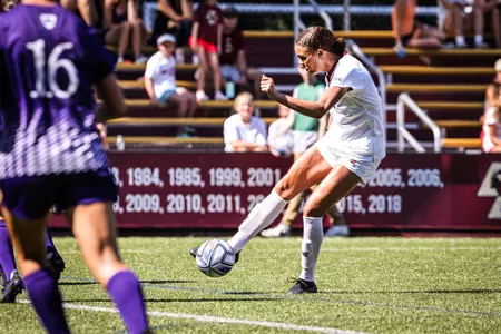 Sydney Segalla takes a right-footed shot against Holy Cross.