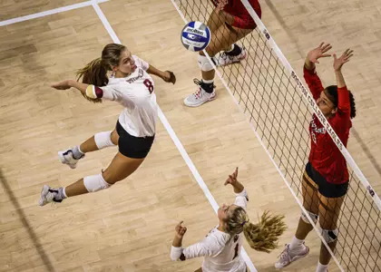 Grace Miliken going up for a spike in match