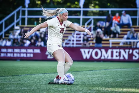Emma Badger kicks the ball up the field against Florida State.