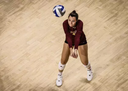 BC's Anna Murphy goes up for a dig in match