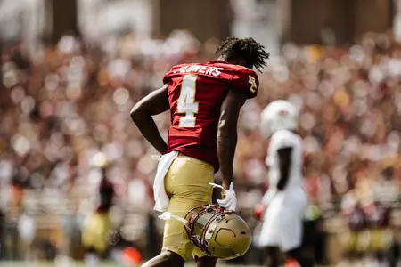 Zay Flowers jogs down the field between quarters vs. Rutgers