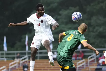 Augustine Boadi heads a ball against Siena
