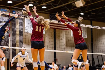 Alayna Crabtree and Kate Brennan blocking a shot vs Montana State