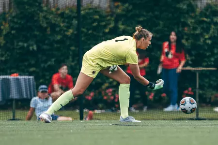 Wiebke Willebrandt rolls the ball to a teammate during a game.