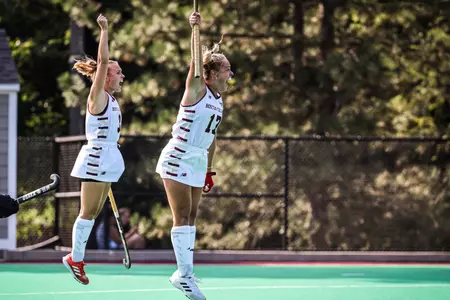 Sarah Johnson and Peyton Hale celebrate a goal in their field hockey game vs. Old Dominion