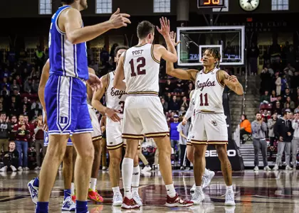 Quinten Post and Makai Ashton-Langford high five as BC played Duke on Jan. 7