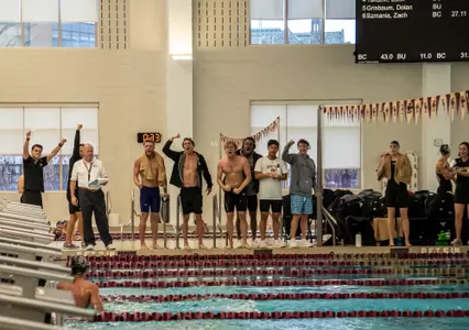 Zach Szmania celebrating with team after breaking 1000 free school record