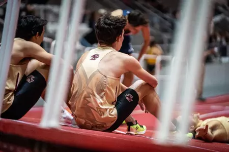Cruz Brown (left), Steven Jackson (middle), and Edward Tristine (right) after mile run at Eagle Elite Invitational