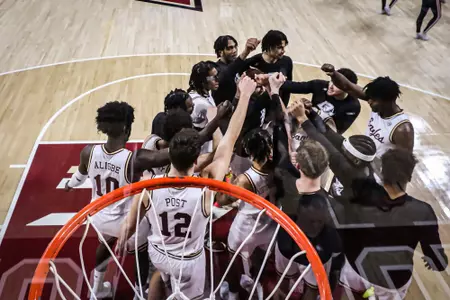 Boston College Men's Basketball huddles up prior to the game