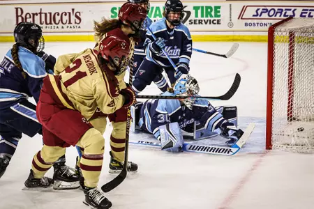 Abby Newhook scores a goal against Maine.