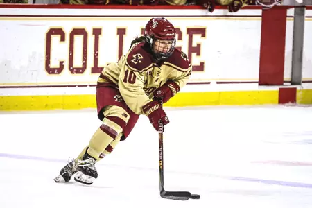 Caroline DiFiore carries the puck through the neutral zone.